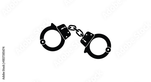 Black metal handcuffs isolated on a white background a stark silhouette