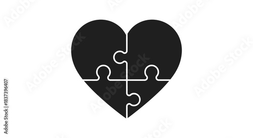 A black heart shape formed from puzzle pieces a striking silhouette