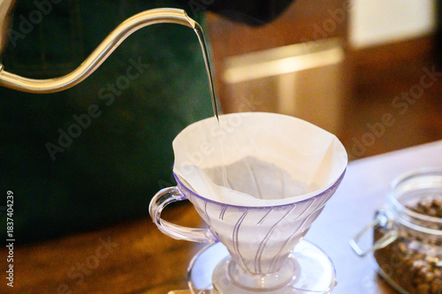 Pouring hot water into hario v60 coffee dripper
