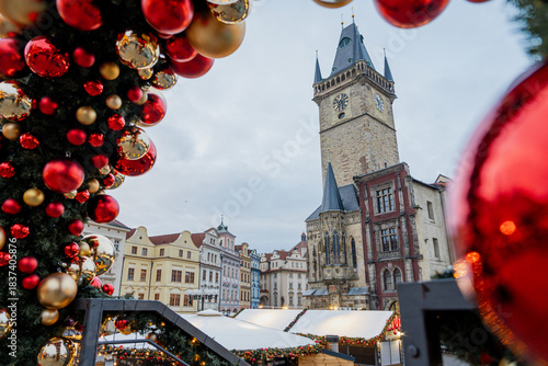 Wallpaper Mural Christmas market at Old Town Square in Prague with the Church of Our Lady before Týn, decorated Christmas tree, festive lights, historic architecture, and magical winter holiday atmosphere. Torontodigital.ca