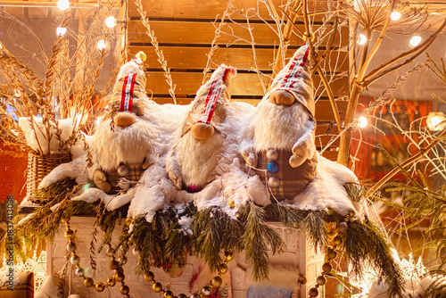 Christmas decor in backyard. Festive New Year decorations. Porch of house decorated for Christmas.