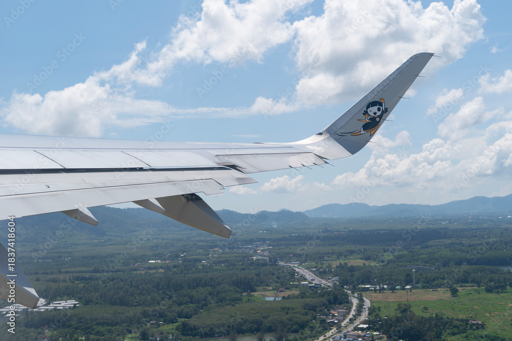 Fototapeta premium View from Scoot Airbus A321neo window during takeoff