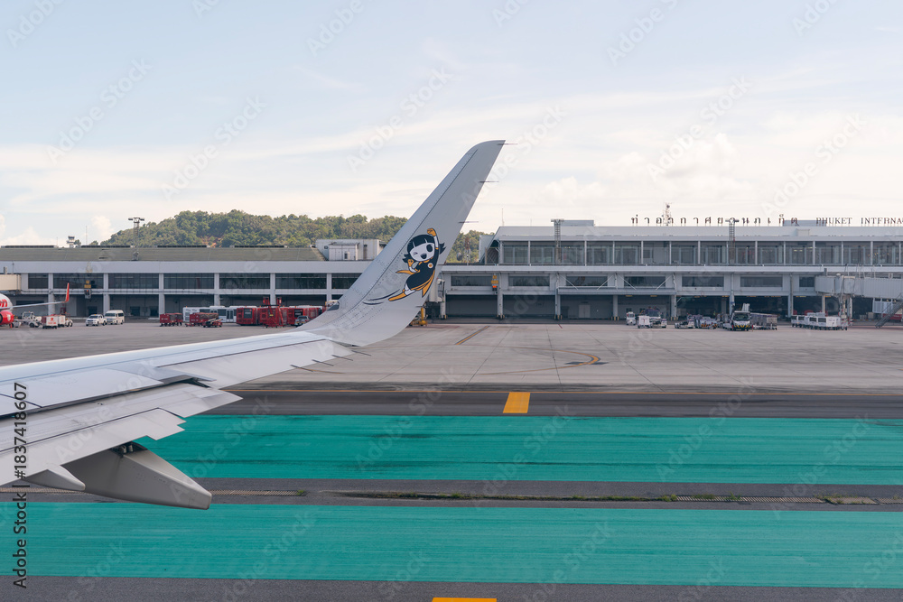 Fototapeta premium Airport terminal view from taxiing Scoot Airbus A321neo