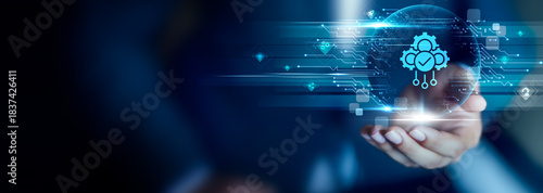 Automation concept, Businessman hold Automation icon for streamlining workflows, reducing manual tasks and improving operational efficiency.