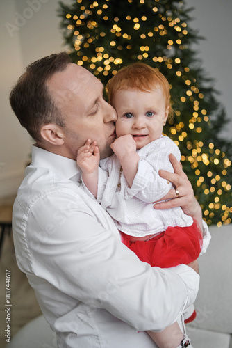 Embracing the warmth of Christmas joy with family on a cozy winter evening