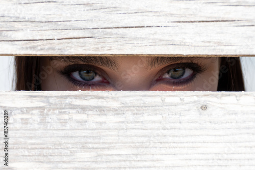 woman looking through the window