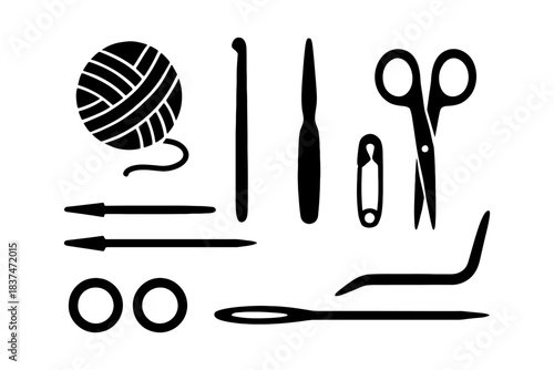 Silhouette of knitting and crochet tools on white background.
