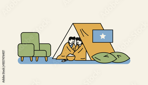 Two individuals build a fort in their living room using blankets and pillows snuggling up with snacks and a movie.