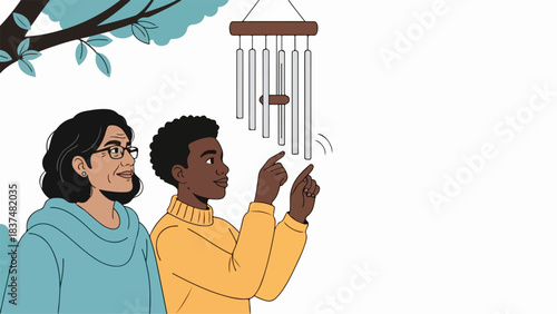 Young boy interacting with metal wind chimes on tree. Woman watches child tapping metal wind chimes, creating gentle sounds. Peaceful wind chimes image for relaxation, garden decor, or calm lifestyle.