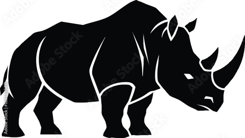 Silhouette of a powerful rhinoceros standing proudly a symbol of strength and resilience.