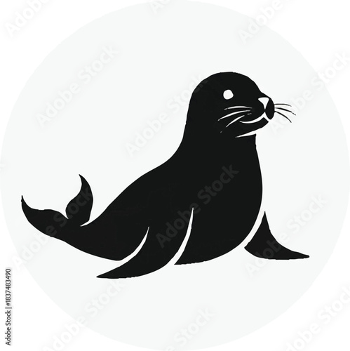 Silhouette of a sleek seal gracefully resting on a surface a captivating image.