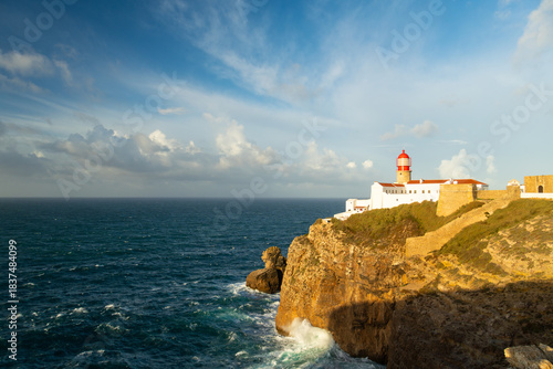Cape Saint Vincent, Sao Vicente Lighthouse and Atlantic Ocean on Sunny Morning. Sagres, Algarve, Portugal