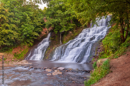 Beautiful summer view of the Chervonohorod (Dzhuryn) waterfall in Ternopil region, Ukraine