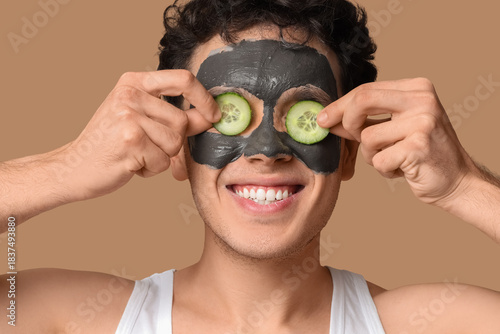 Young man with applied faci...