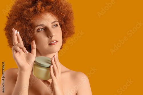 Young redhead woman with ja...