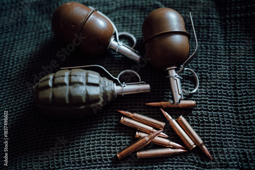 grenades and bullets on fabric