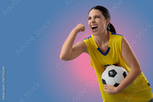 Female soccer fan with ball...