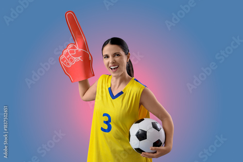 Female soccer fan with ball...