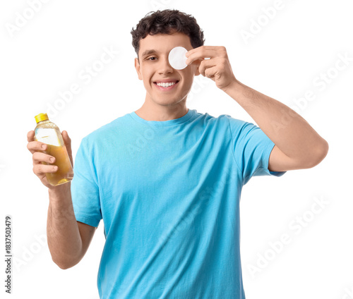 Young man with bottle of mi...