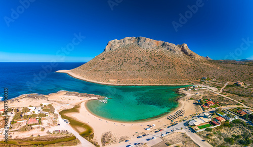 Fototapeta Naklejka Na Ścianę i Meble -  Aerial image of famous Stavros Zorbas beach, Crete Island, Greece, near Chania