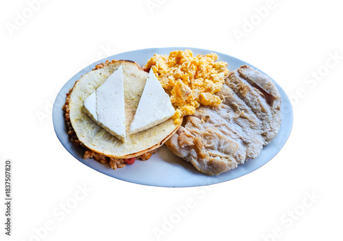 Traditional breakfast with calentado (rice and beans), arepa with fresh cheese, scrambled eggs, and pork.