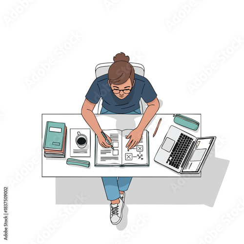 Young woman working on a project at her desk