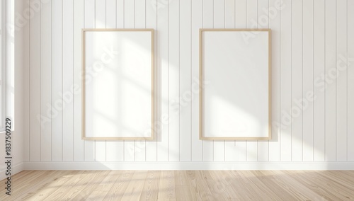 interior displaying two vertical frames with thin light-wood borders mounted on a white wooden-plank wall