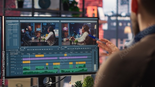 Fotografie Video editors team working with AI chatbot and montage maker software, editing a background video and mixing clips on dual monitors
