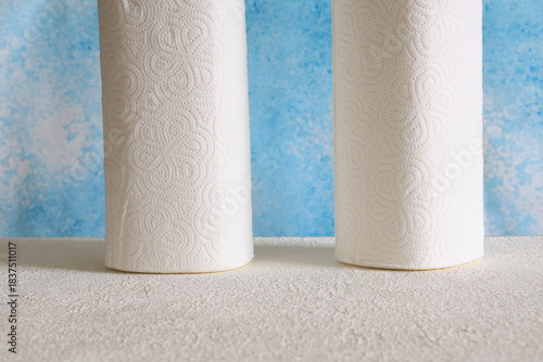 Close-Up of Rolled Paper Towels on a Blue Background