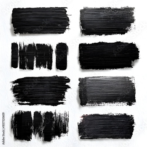Collection of eight black paint strokes and textures on s create a grunge and artistic backdrop with a raw, minimalist aesthetic appeal.
