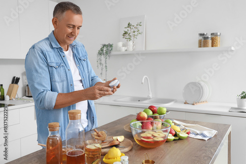 Mature man with sugar makin...