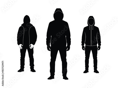 Silhouettes of three people wearing hooded jackets and pants