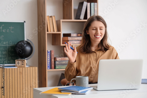 Female teacher conducting E...