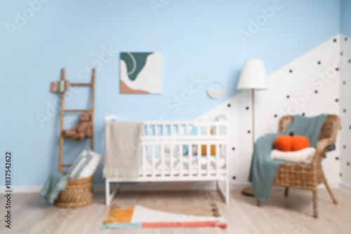 Stylish white crib with pla...