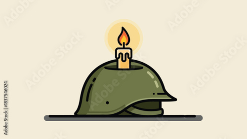 A soldier's helmet bearing a lighted candle conveys quiet tribute and solemn remembrance