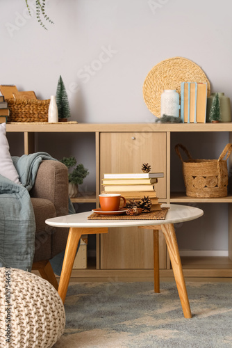 Coffee table with cup of ho...