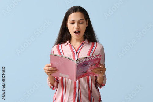 Happy young woman with fash...