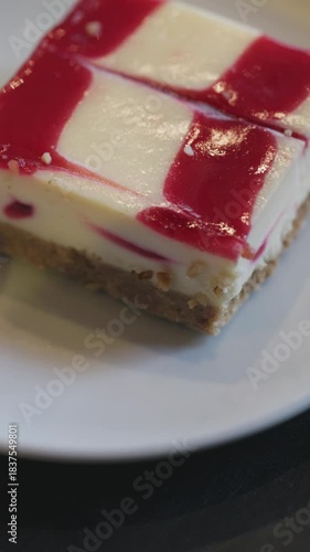 Close-Up of Raspberry Cheesecake on a White Plate