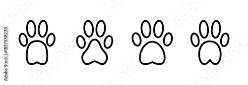 Paw icon vector illustration. paw print sign and symbol. dog or cat paw