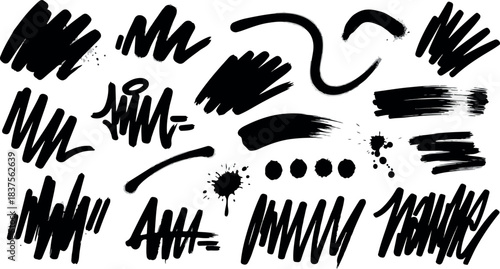 Collection of black stylized handdrawn brush strokes scribbles and splatters on white