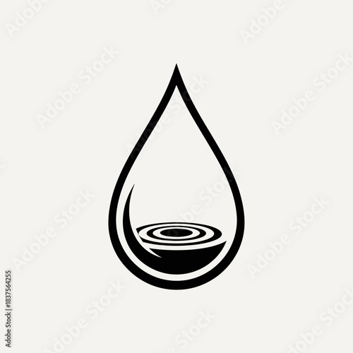 Elegant black water drop with ripple effect inside, representing purity, freshness, and sustainability, perfect for branding natural products and wellness initiatives