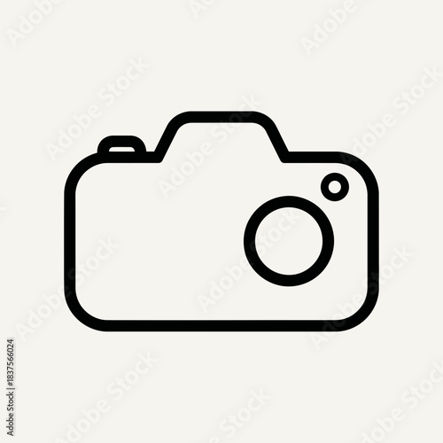 Aerial view of a vibrant cityscape with modern skyscrapers towering over a bustling street and a clear blue sky