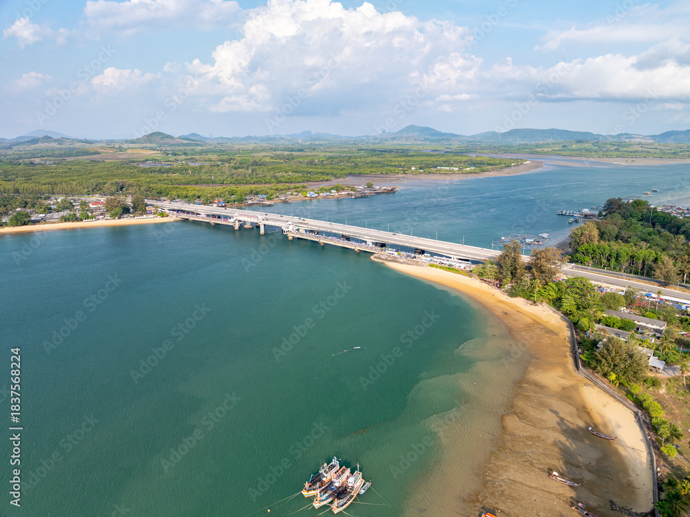 Fototapeta premium Aerial view of Sarasin bridge road transportation background concept The bridge is a between Phang Nga and Phuket island Thailand The bridge is the most important in making business and transportation