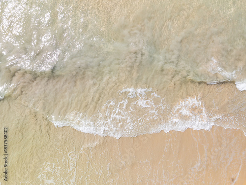Aerial top view beach sea waves surface nature background