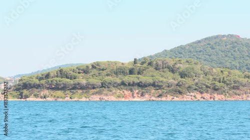 Distant View of Aegean Islands in Harsh Midday Sun
