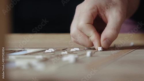 Man Building Architecture Model by Hands Close Up. Adult Person Constructing Town Landscape and Making Sketch of Real Roads with Small Cars. Caucasian Manager Crafting Trendy View of People Lifestyle