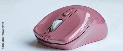 A small heart-shaped wireless mouse with soft-touch finish