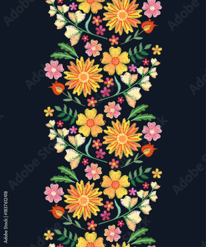 Floral seamless vertical border with yellow and pink  embroidered flowers and green leaves	
