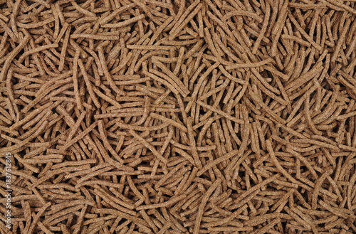 High fibre bran sticks breakfast cereal background texture detail