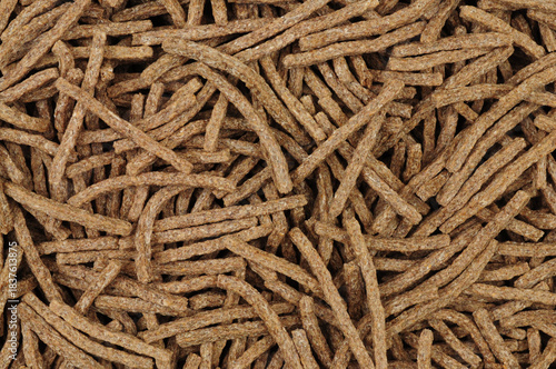 High fibre bran sticks breakfast cereal background texture detail